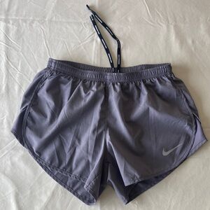 Nike Women’s Gray Athletic Shorts with Drawstring, inner liner, zip back pocket